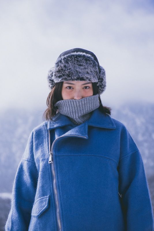 woman wearing winter layers