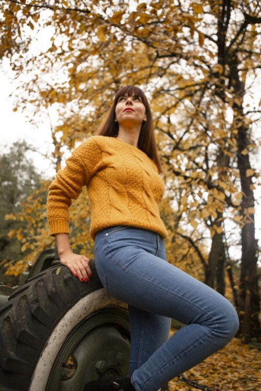 mustard yellow sweater and jeans