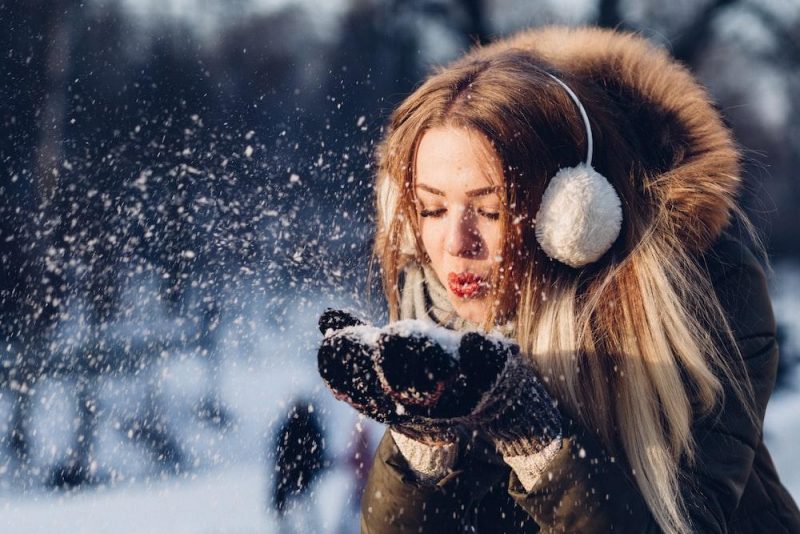 woman wearing ear muffs for dress for hill station