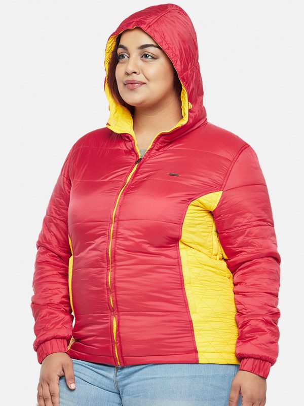 woman wearing puffer jacket with hood for layering for winter