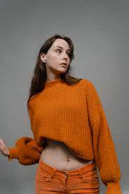 woman wearing a cropped style sweater