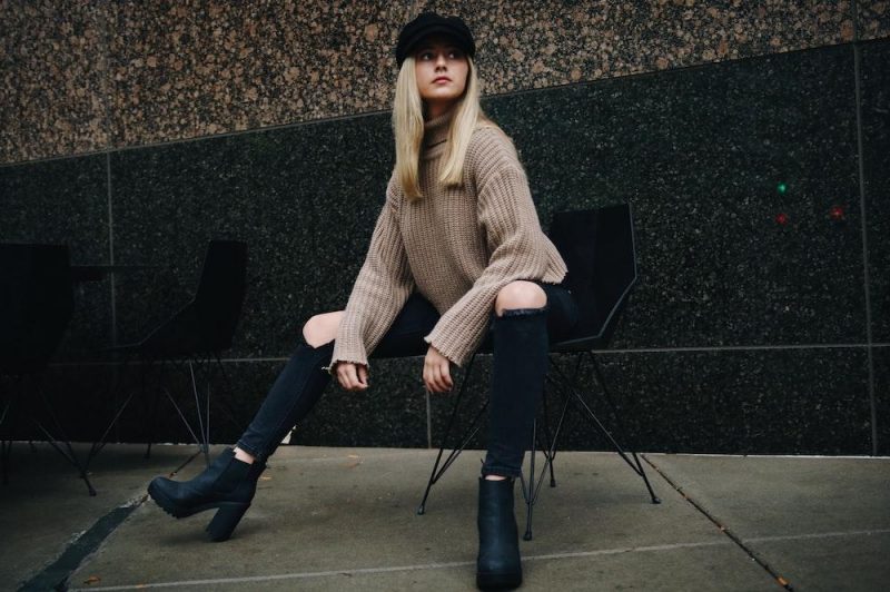 woman wearing high boots for winter fashion