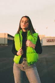 woman wearing puffer vests